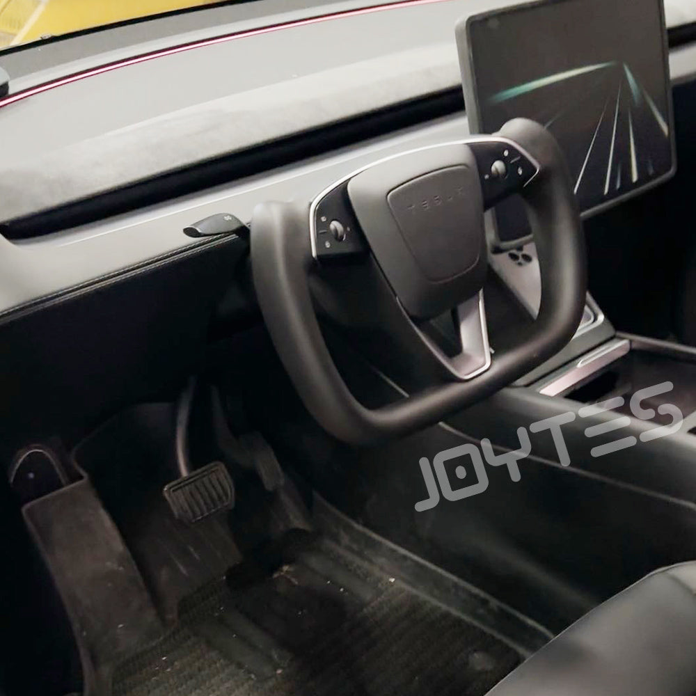 white tesla yoke steering wheel