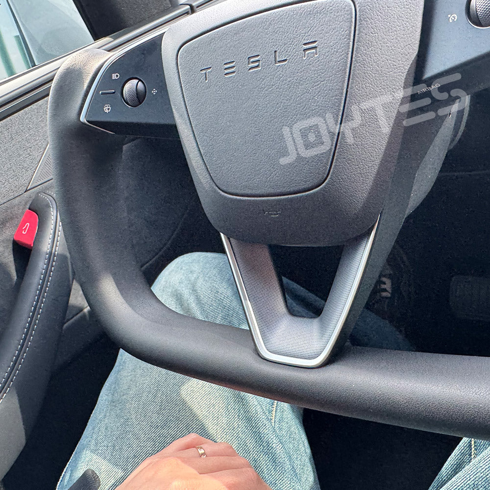 new tesla steering yoke