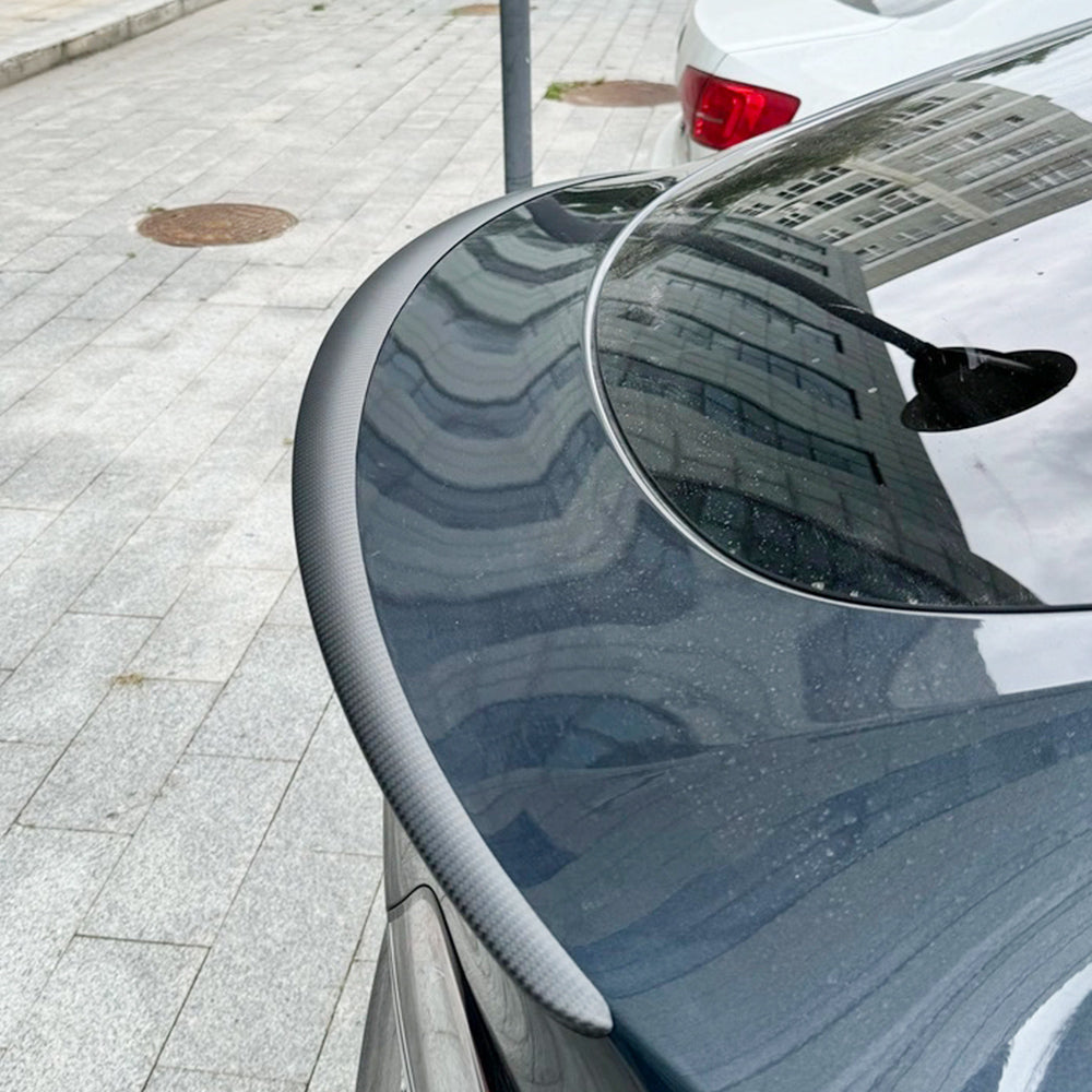 tesla carbon fiber