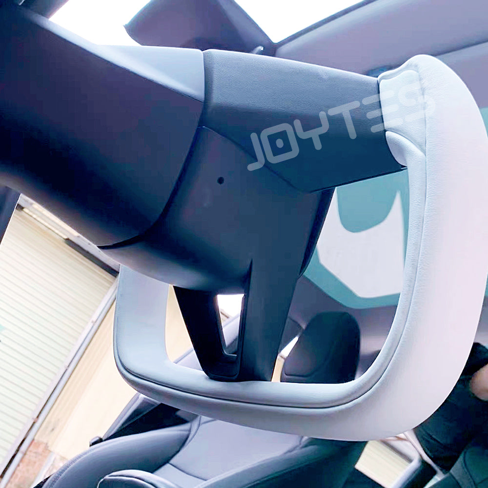 tesla plaid yoke steering wheel
