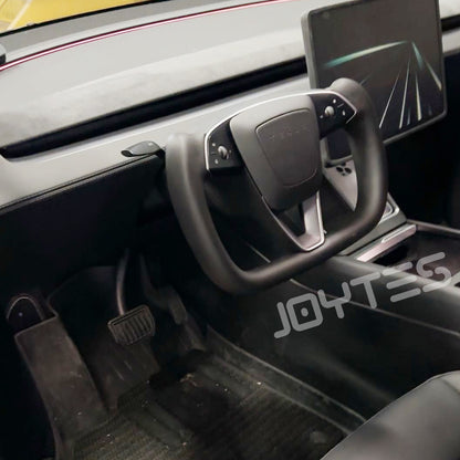 white tesla yoke steering wheel