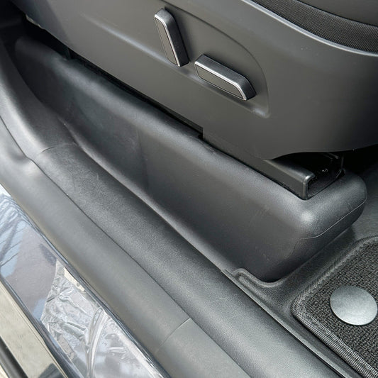 under-seat flocking guards